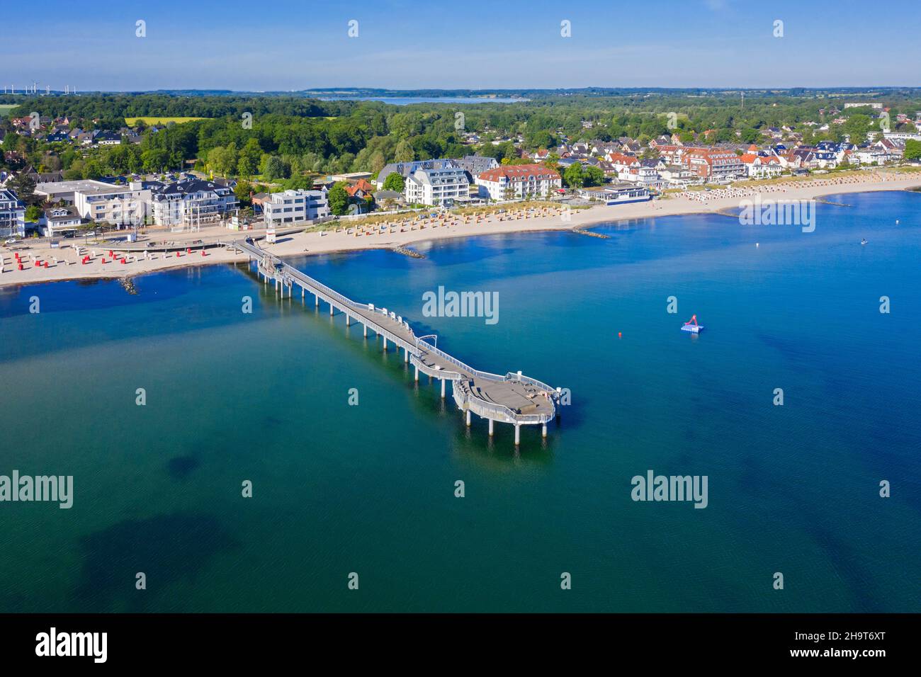 Aerial view over wooden pleasure pier and hotels at seaside resort Niendorf along the Baltic Sea, Timmendorfer Strand, Schleswig-Holstein, Germany Stock Photo