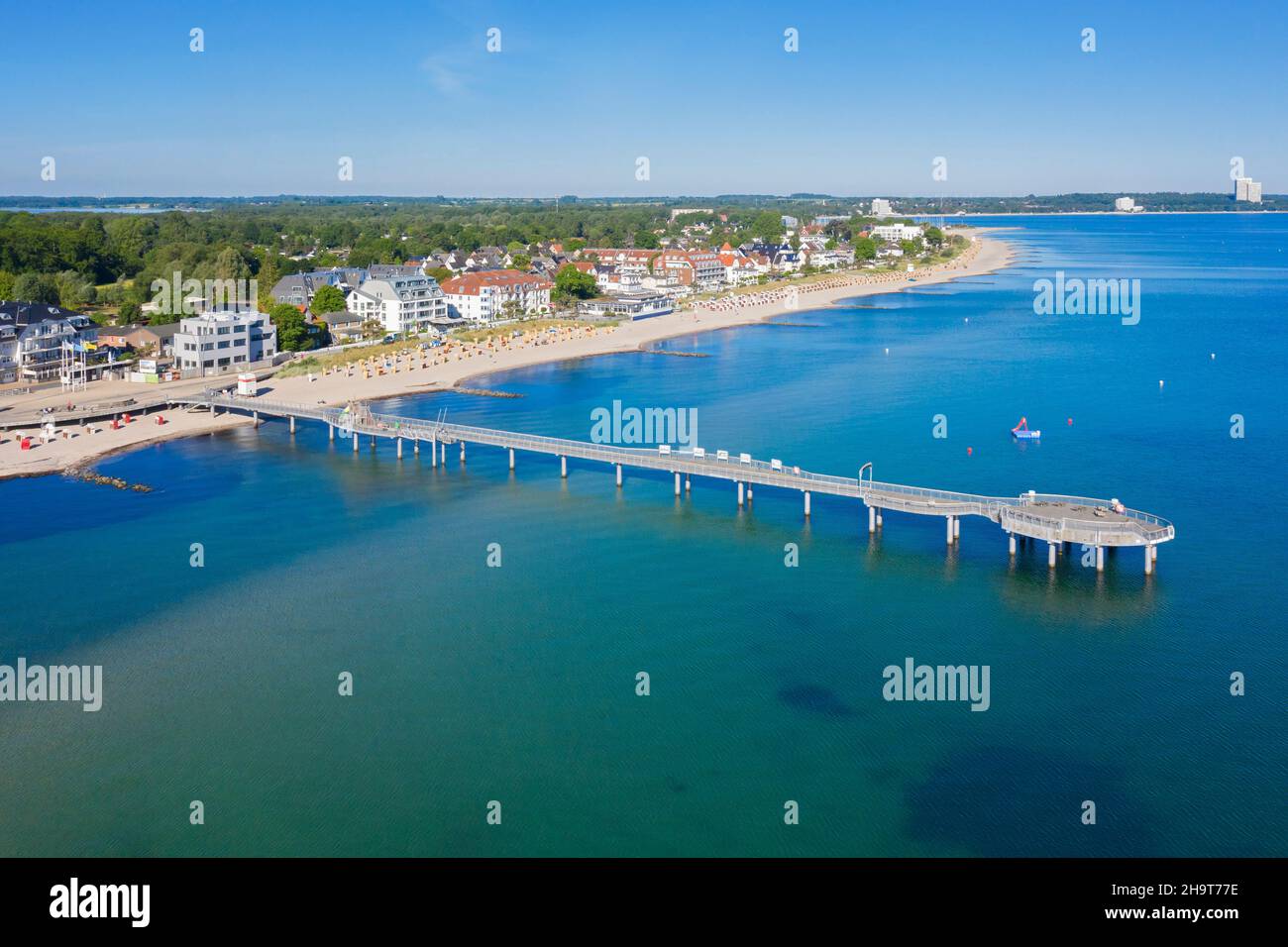Aerial view over wooden pleasure pier and hotels at seaside resort Niendorf along the Baltic Sea, Timmendorfer Strand, Schleswig-Holstein, Germany Stock Photo