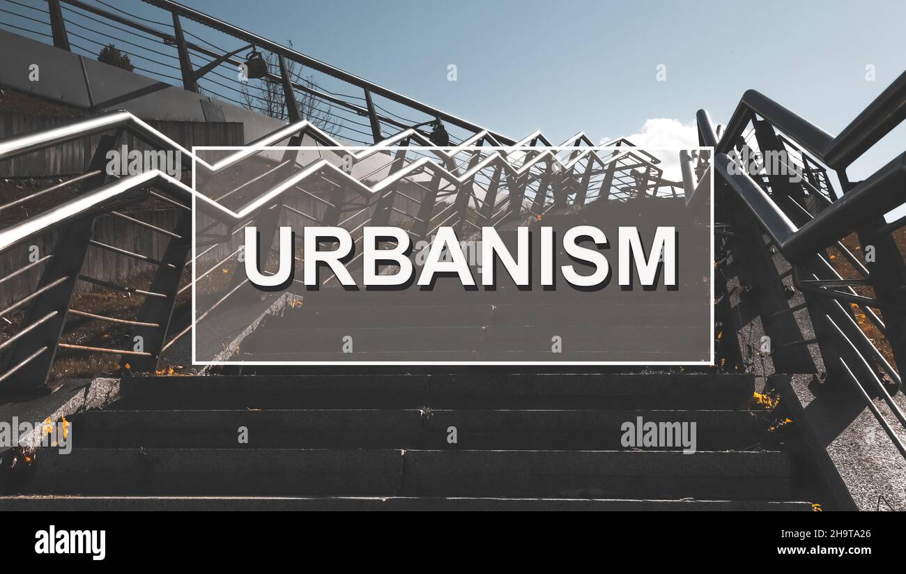Urbanism word on city photo. Urban study concept. Stock Photo