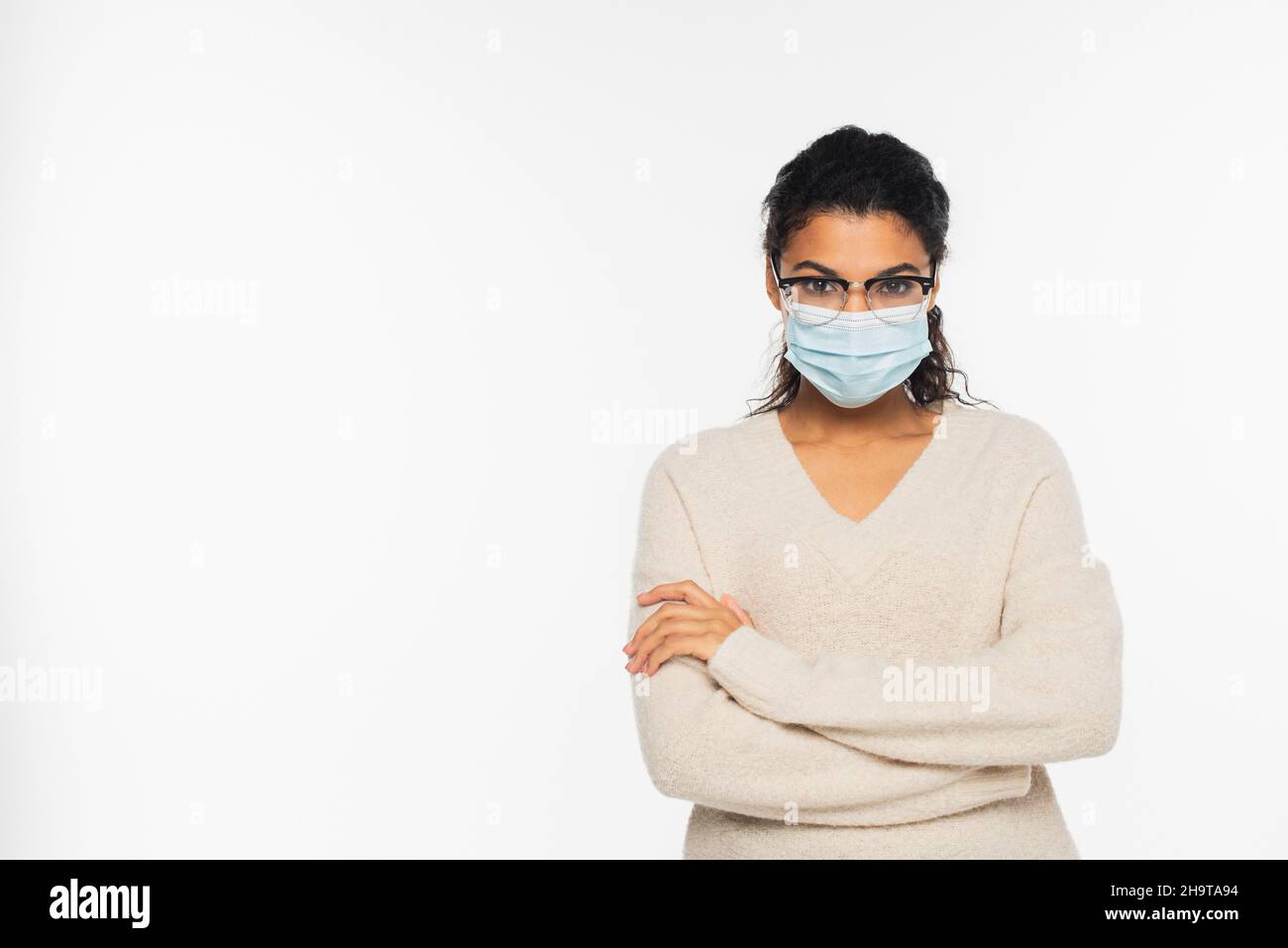 African american woman in eyeglasses and medical mask standing with ...