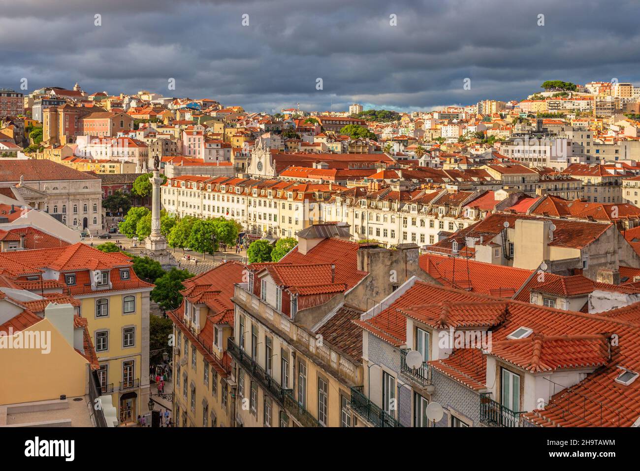 View to King Pedro IV Square and old city center streets with orange tiled houses , Lisbon, Portugal Stock Photo