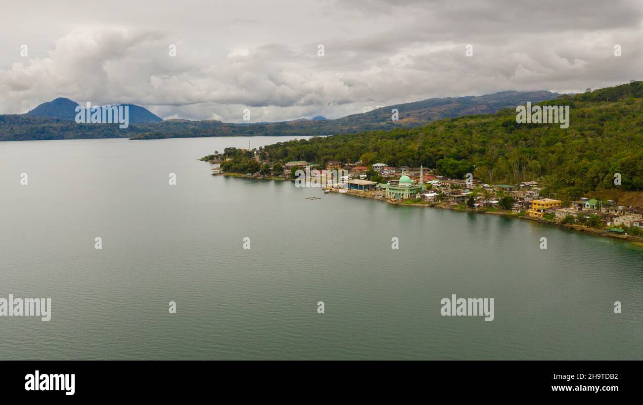Aerial drone of Mosque on the shore of lake Lanao. Mindanao, Lanao del Sur, Philippines. Stock Photo