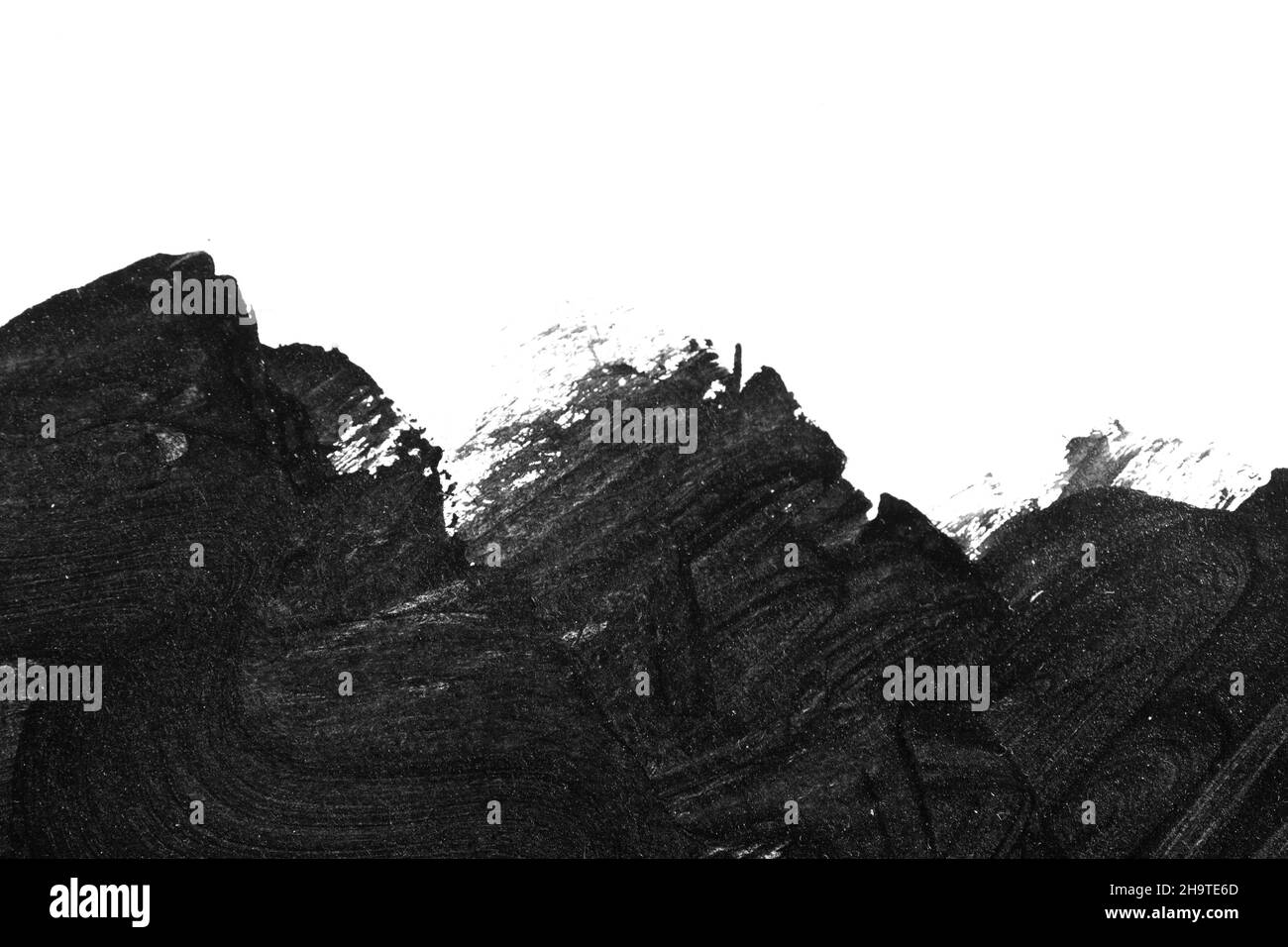 Black brush strokes on white paper isolated Stock Photo - Alamy