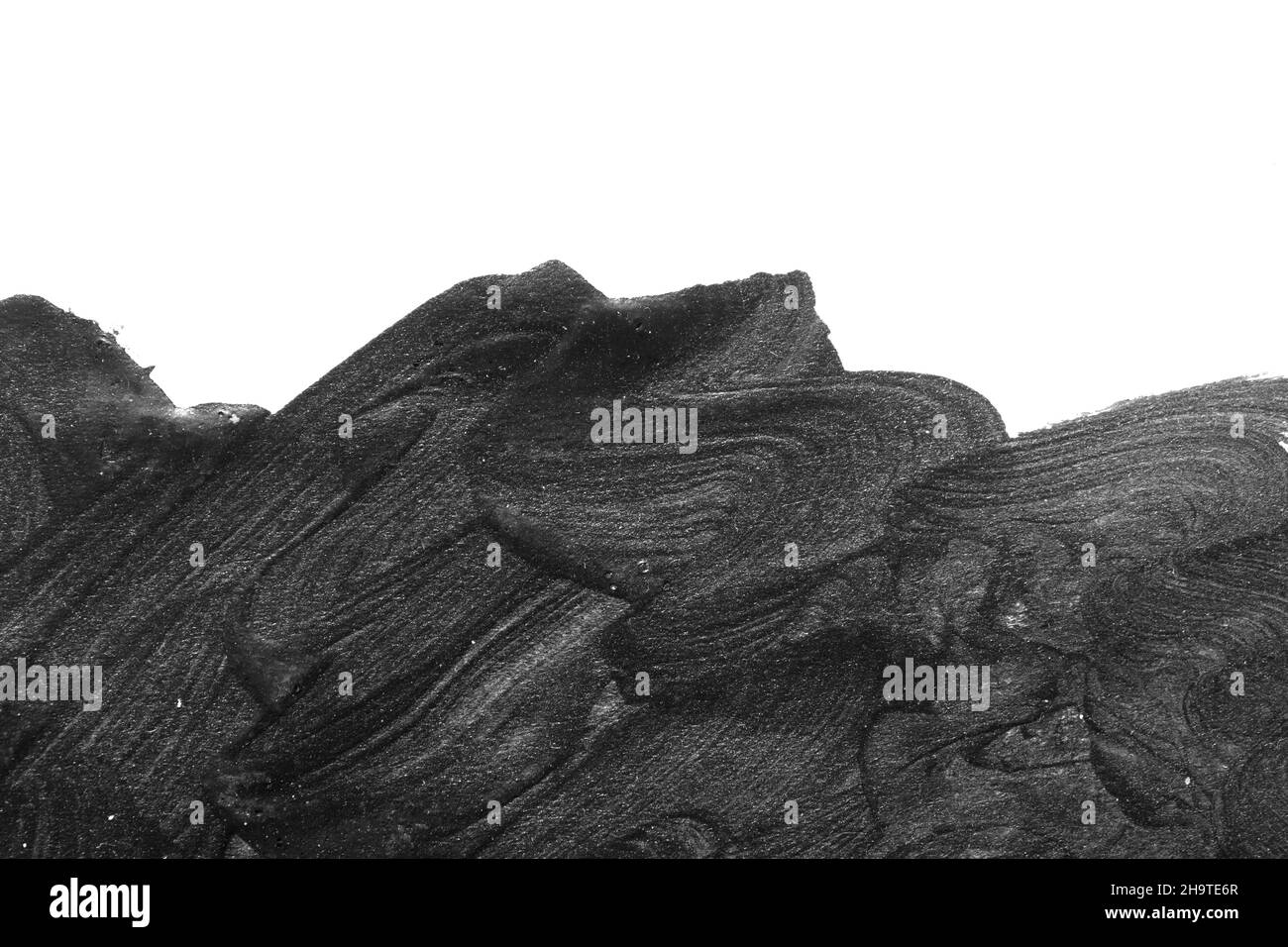 Black brush strokes on white paper isolated Stock Photo - Alamy