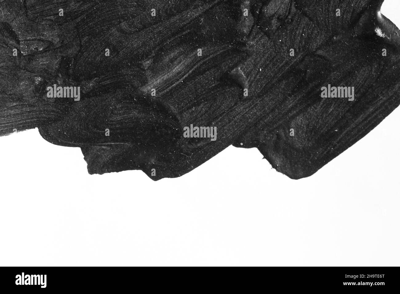 Black brush strokes on white paper isolated Stock Photo - Alamy