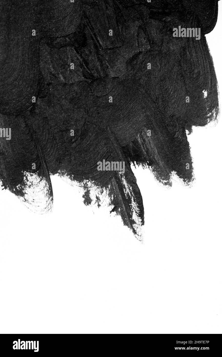 Black brush strokes on white paper isolated Stock Photo - Alamy