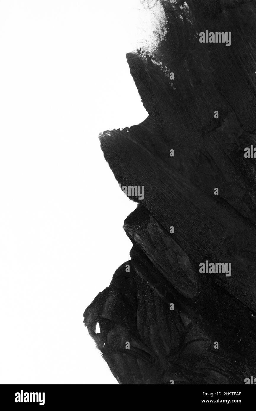 Black brush strokes on white paper isolated Stock Photo - Alamy