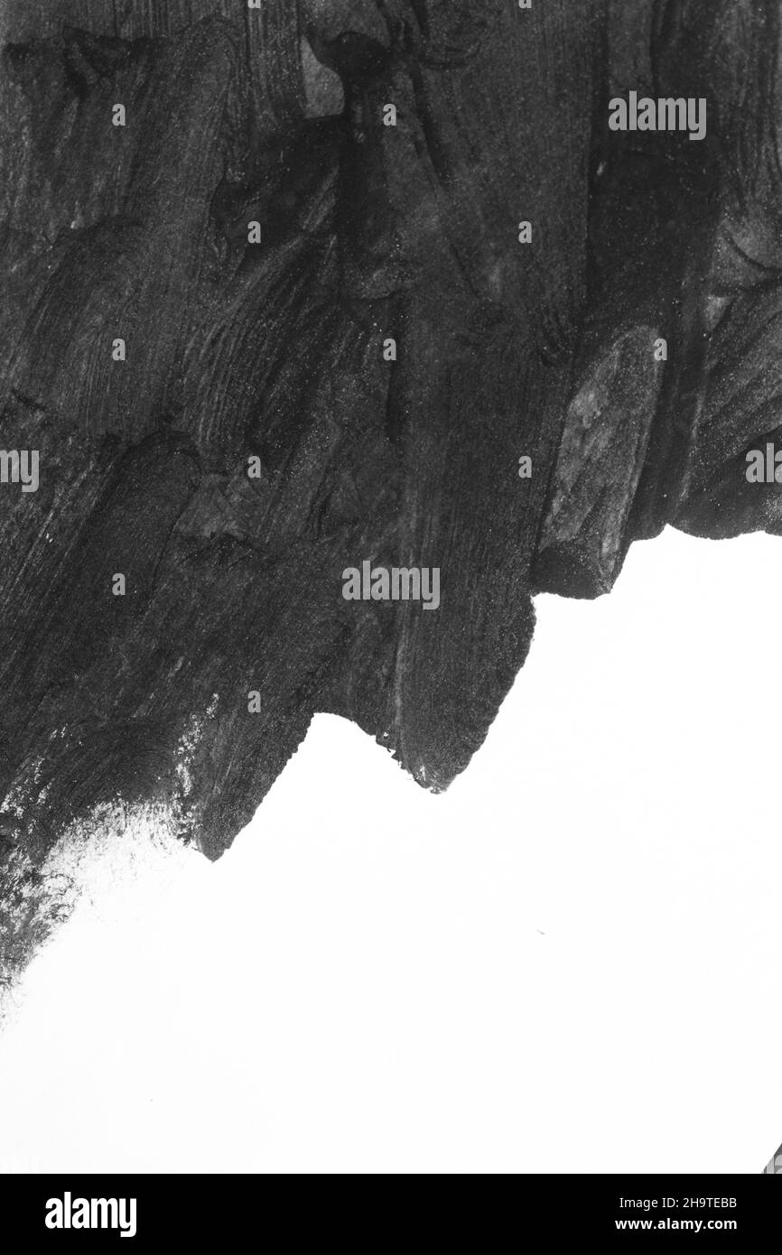 Black brush strokes on white paper isolated Stock Photo - Alamy