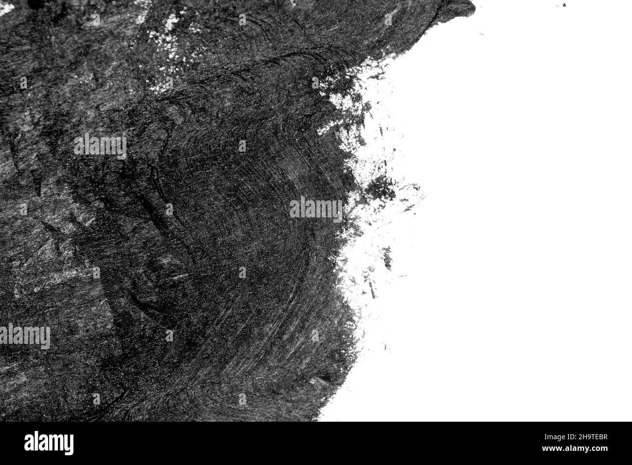 Black brush strokes on white paper isolated Stock Photo - Alamy