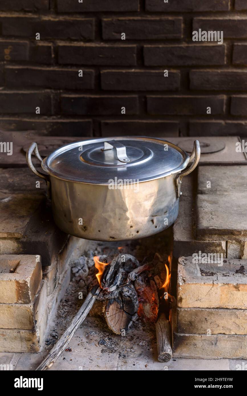 Wood stove with aluminum pan Stock Photo Alamy