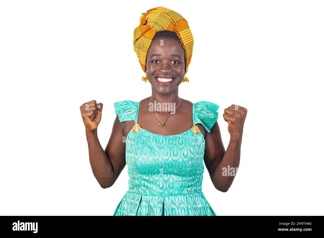 beautiful young woman wearing traditional holding, making a victory