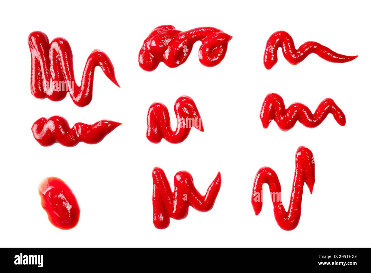 Ketchup splashes isolated on white background Stock Photo - Alamy