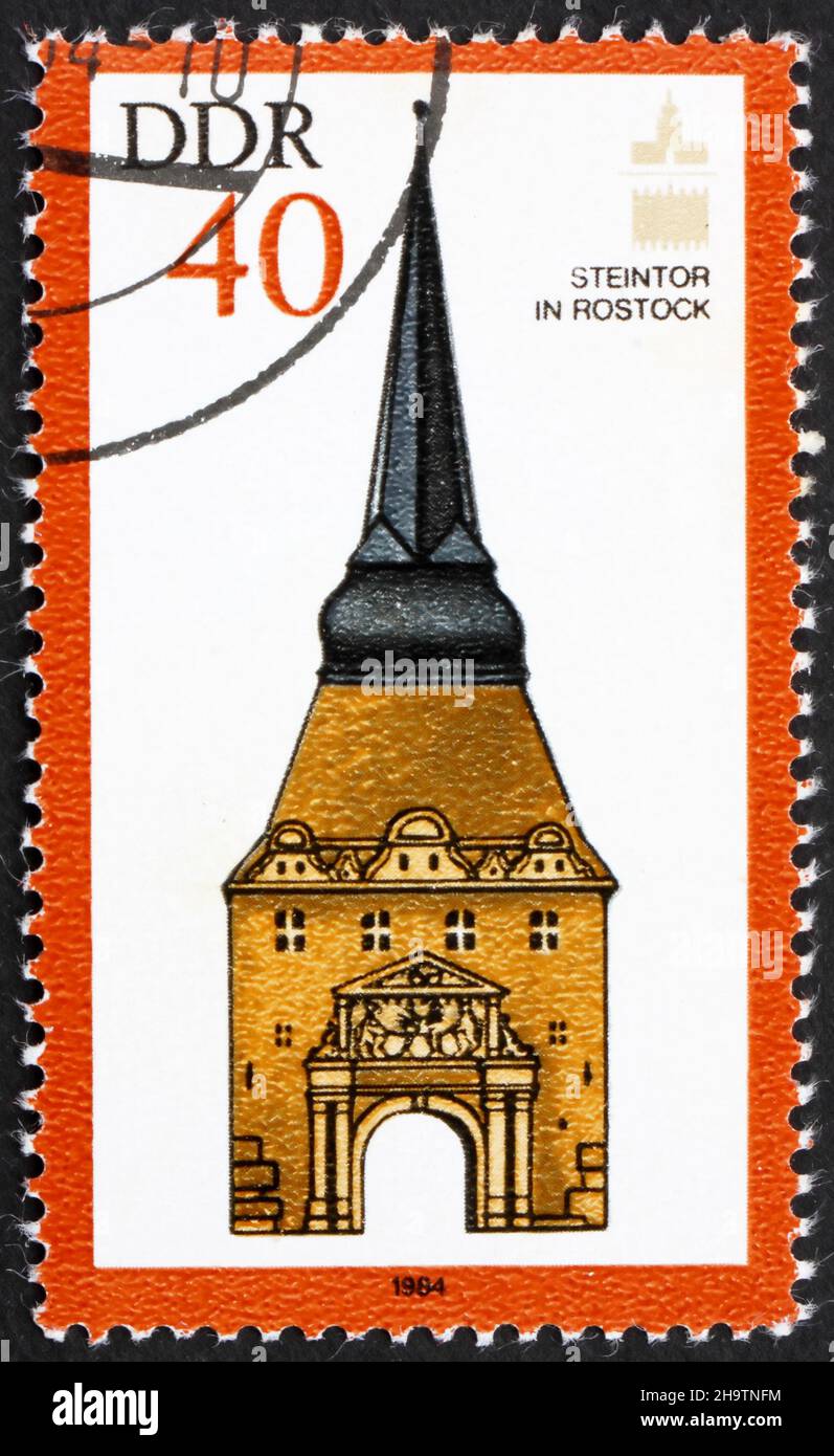 Stone Gate Rostock GDR - CIRCA 1984: a stamp printed in GDR shows Stone Gate, Rostock ...