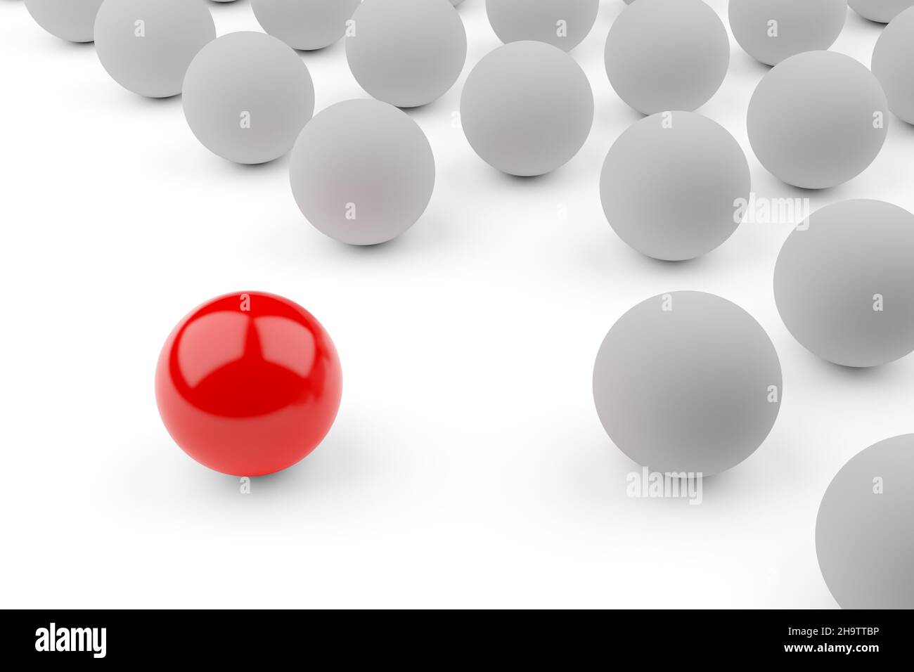 Single red ball standing out from the crowd of white spheres, leadership, standing out or bravery concept over white background, 3D illustration Stock Photo