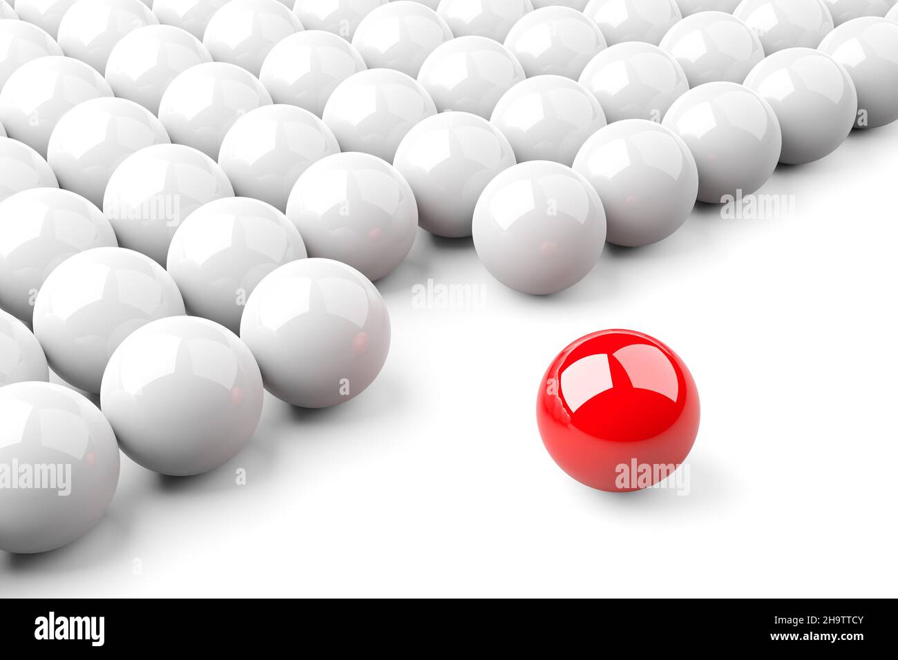 Single red ball standing out from the crowd of shiny white spheres, leadership, standing out or bravery concept over white background, 3D illustration Stock Photo