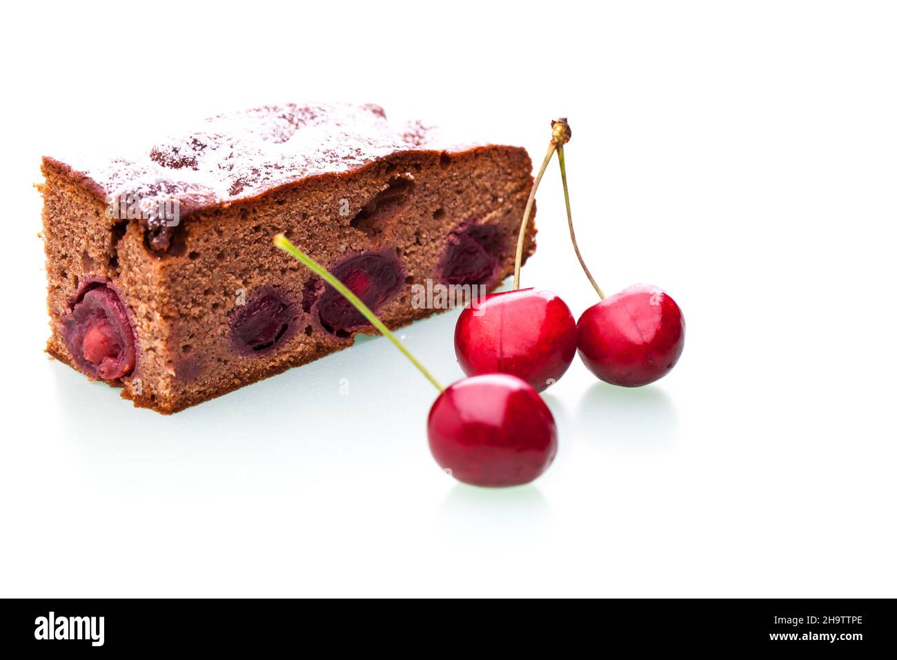 Cherries, cake, cherry cake, piece of cake, icing sugar, chocolate cake, piece, fruit, fruit cake, white, background, cherry, full, genuine, real, fru Stock Photo