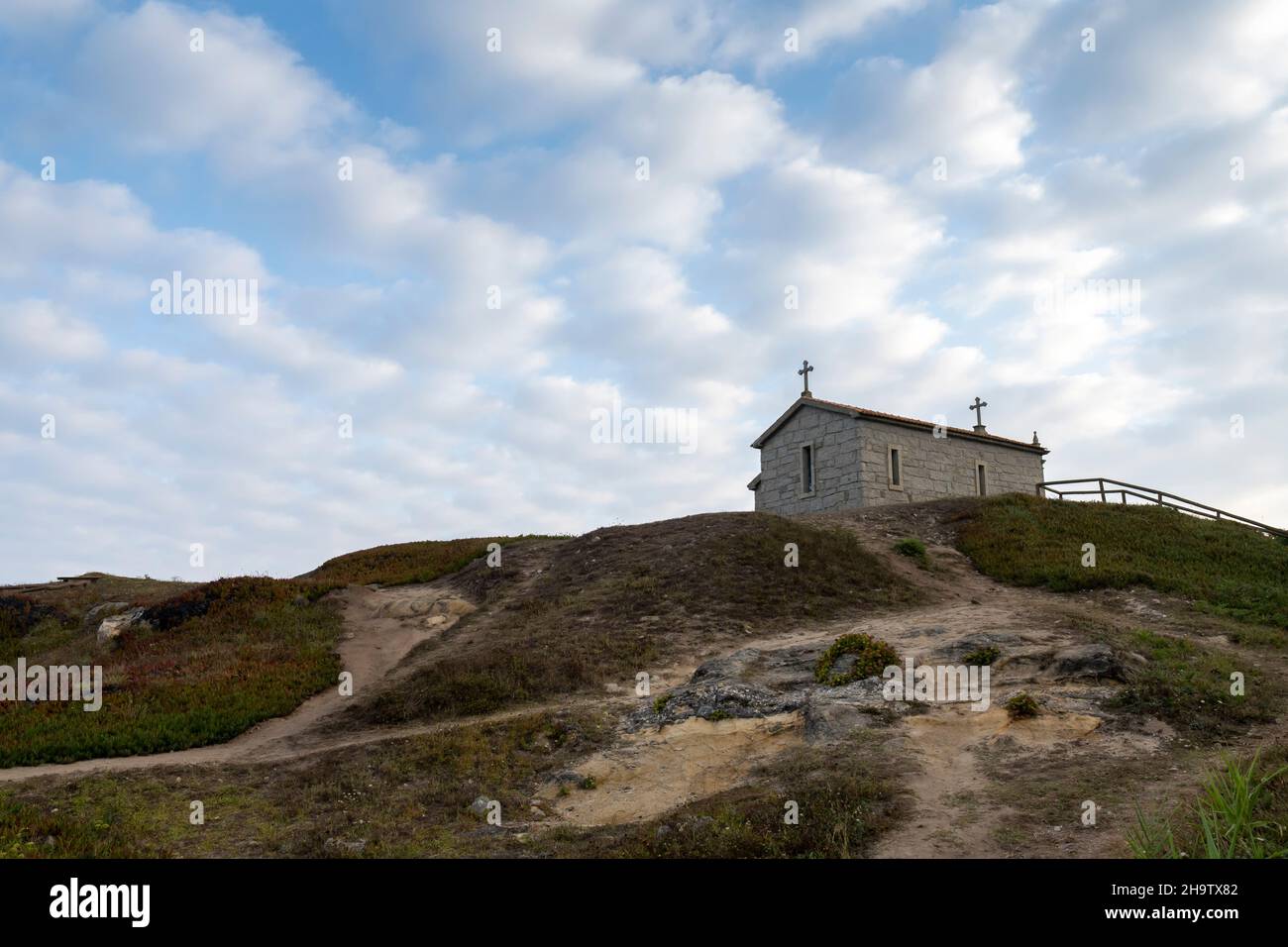 The sun rises over the Capela de São Paio along the Camino Portuguese in Vila Chã, Portugal. This route of the Camino de Santiago pilgrimage runs nort Stock Photo