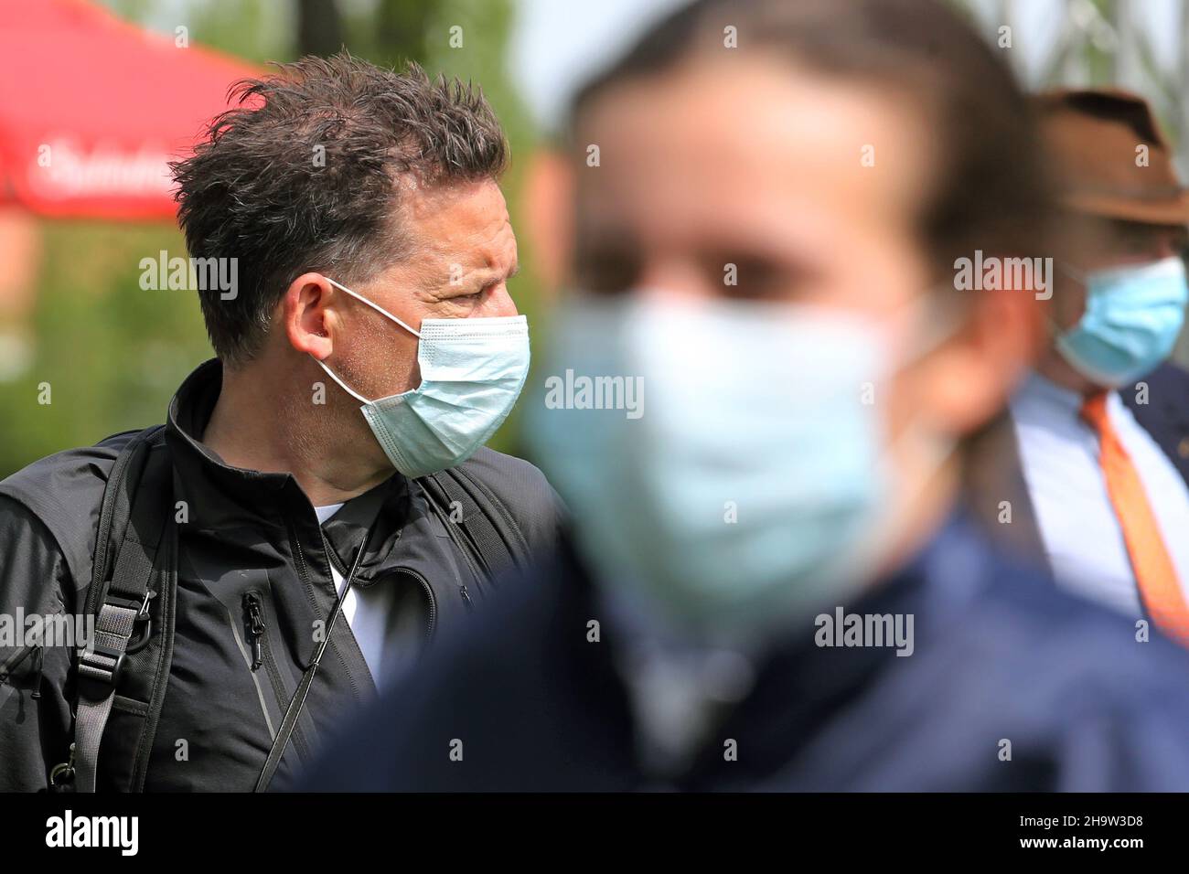 '14.05.2021, Germany, Saxony-Anhalt, Magdeburg - People wearing surgical masks outdoors.. 00S210514D276CAROEX.JPG [MODEL RELEASE: NO, PROPERTY RELEASE Stock Photo