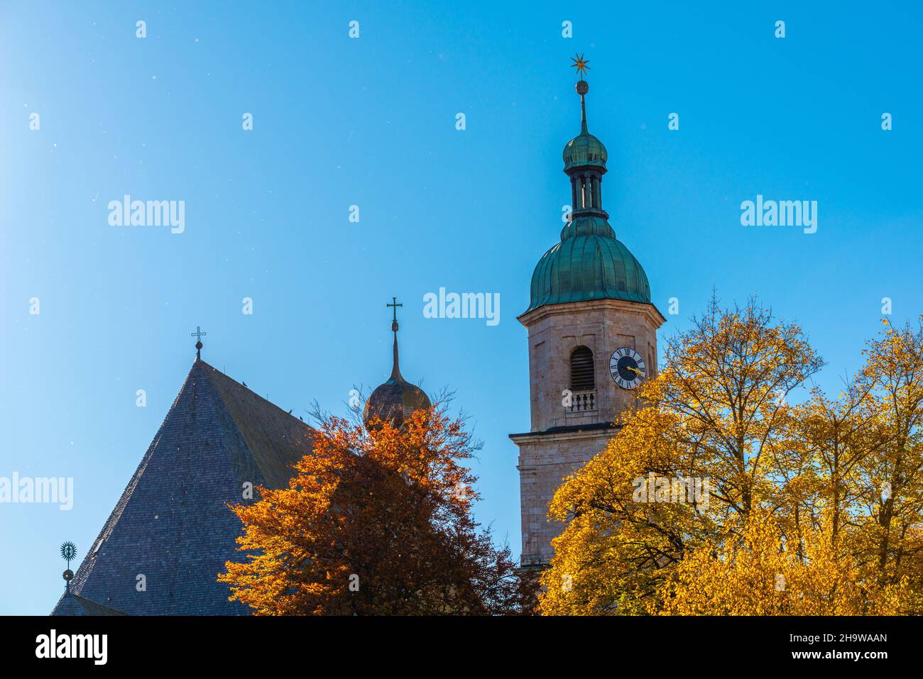 Historic monument and listed building Monastery Franziskanerkloster and tower of Franciscan Church, Berchtesgaden, Upper Bavaria, Southern Germany Stock Photo