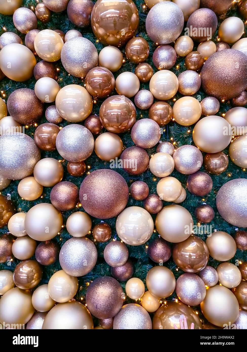Christmas balls abstract background. Beautiful and colorful holiday decorations with globes on a Christmas tree Stock Photo