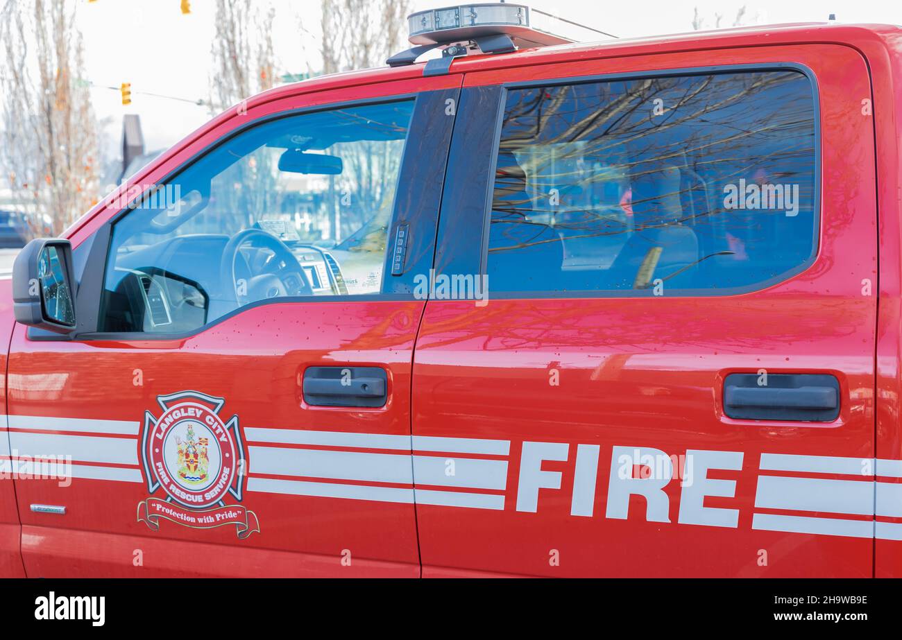 Close up of FIRE sign on the front of a BC Langley fire servise vehicle. Close up of fire rescue service vehicle of Langley department Canada-November Stock Photo