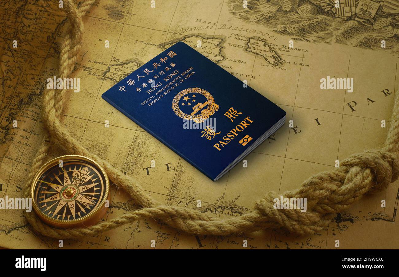 Official passport of Hong Kong on the top of an world map Stock Photo