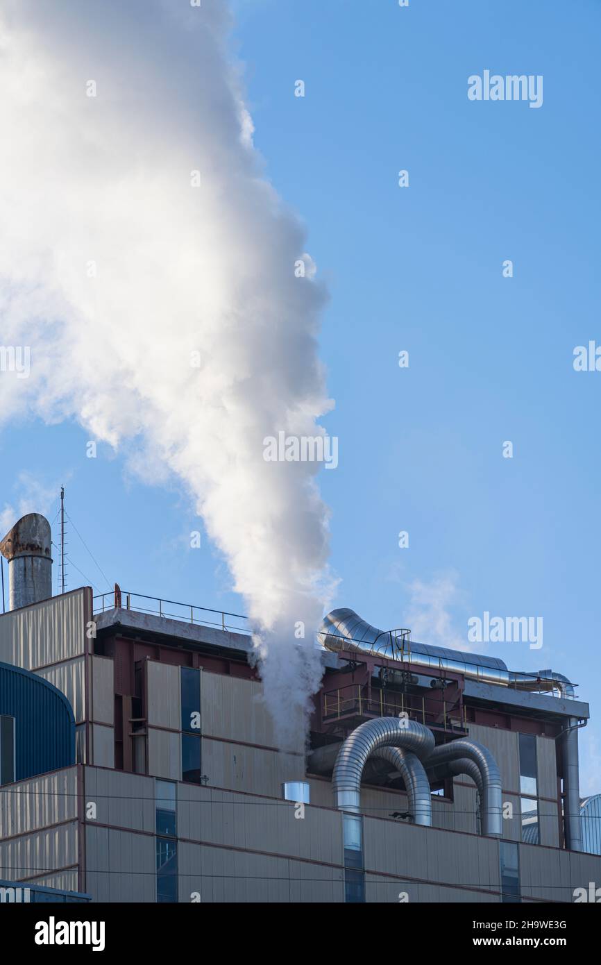 smoke emissions from an industrial chimney Stock Photo