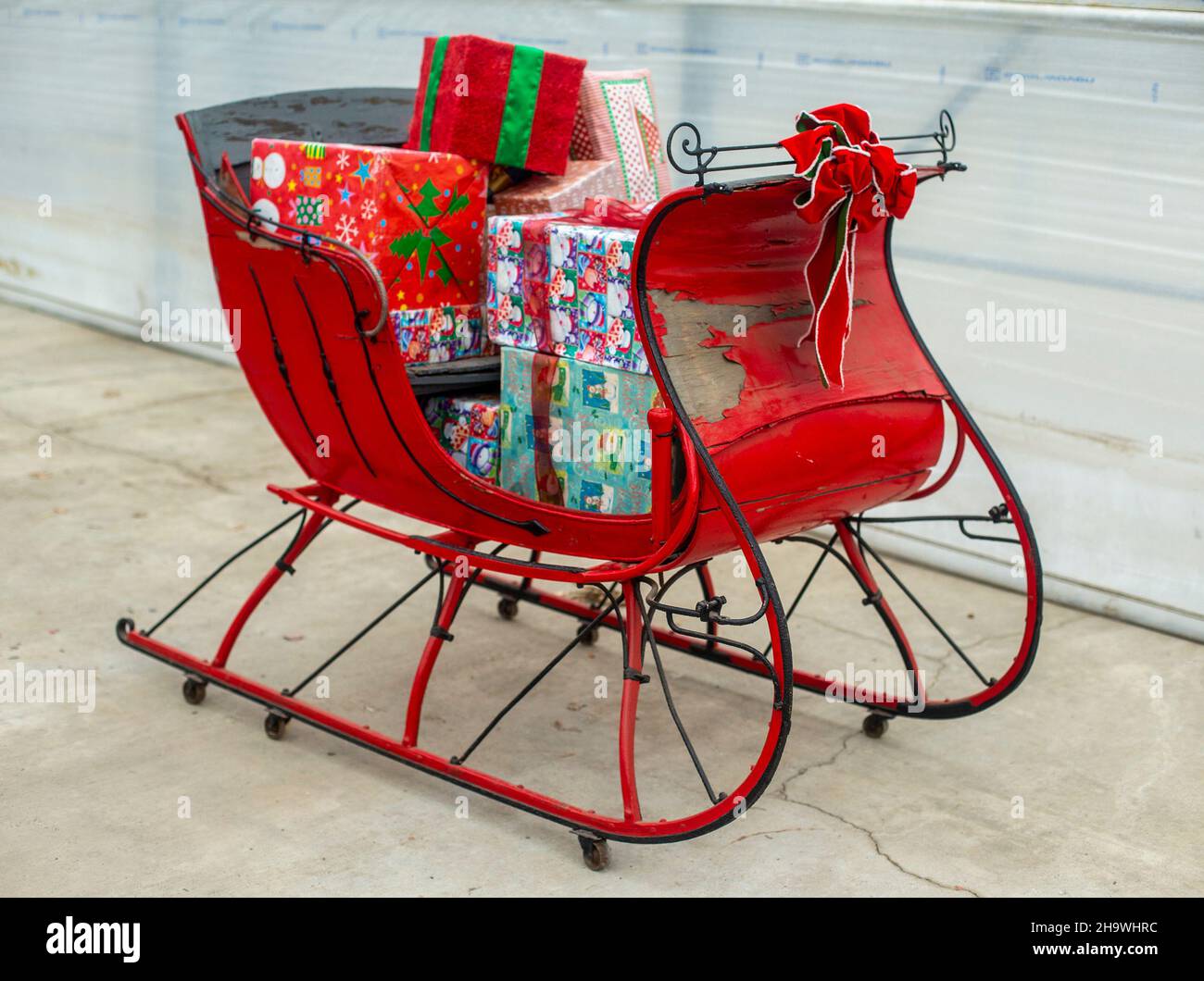 Antique sleigh with Christmas presents Stock Photo