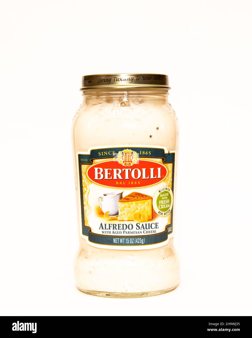 A jar of Bertolli Alfredo Sauce with aged Parmesan Cheese, isolated on white Stock Photo