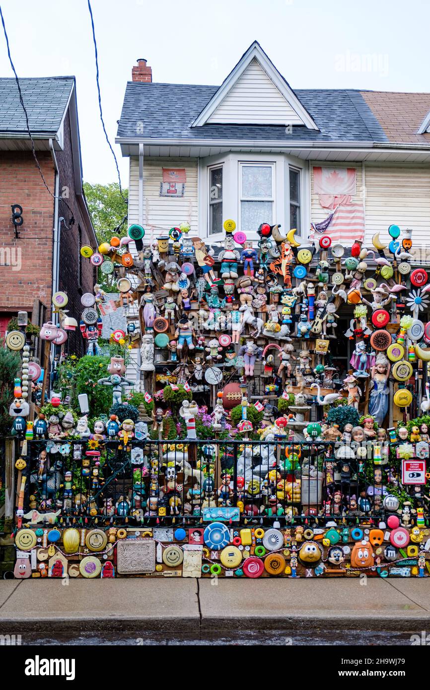 A house decorated with dolls and toys in the Leslieville neighbourhood, known as The Doll House, Toronto, Ontario, Canada Stock Photo
