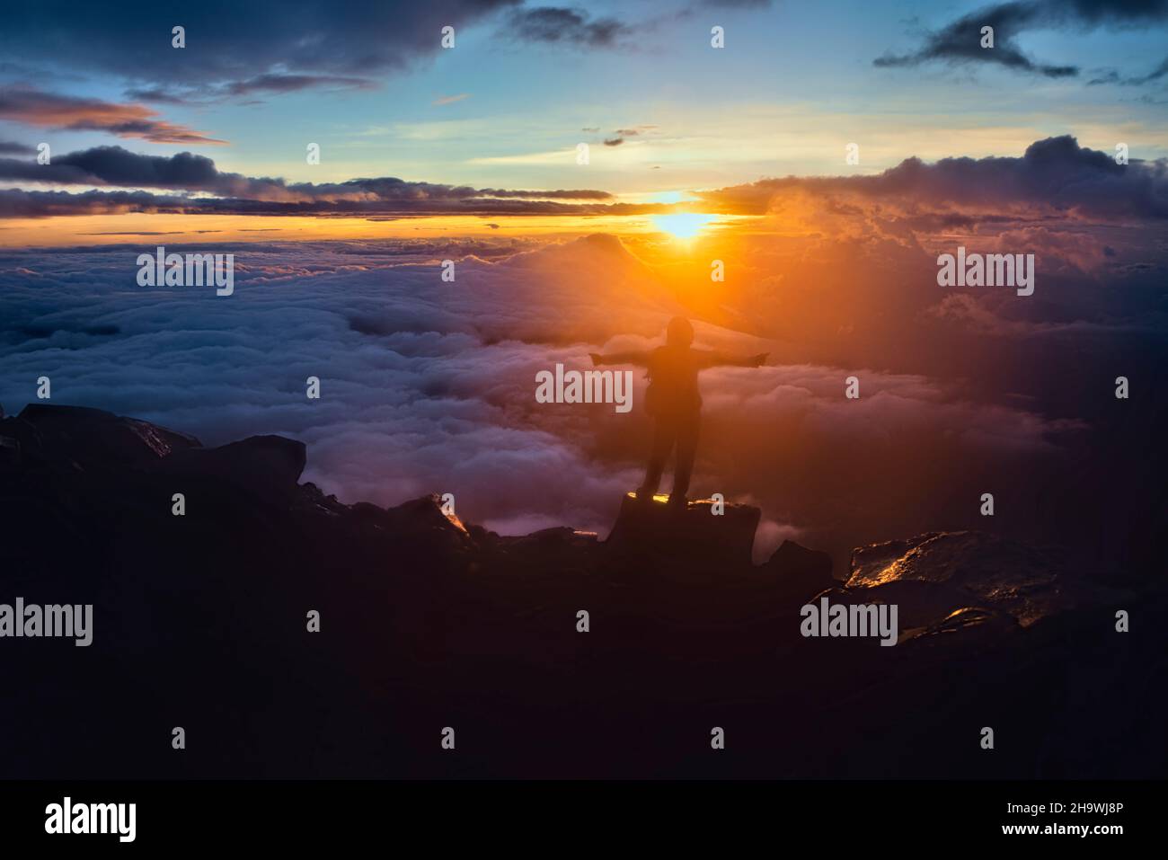 Climber At Sunrise On Acatenango Volcano Antigua Guatemala Stock climber-at-sunrise-on-acatenango-volcano-antigua-guatemala-stock