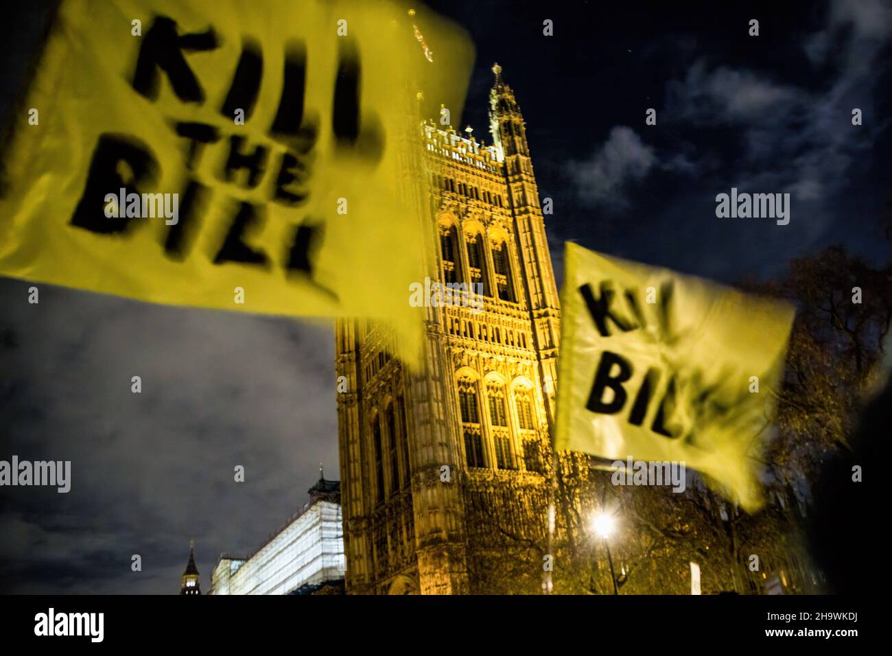 London, UK. 08th Dec, 2021. A protestor holds a Kill the Bill flag during the demonstration. Demonstrators gathered at the House of Lords to add pressure to the Lords third reading and vote on the Policing, Crime, Sentencing and Courts Bill. Credit: SOPA Images Limited/Alamy Live News Stock Photo
