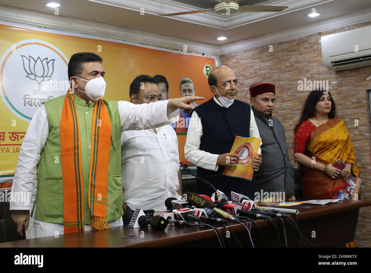 Kolkata, India. 8th Dec, 2021. BJP Nandigrame MLA Suvendu Adhikari lead the press conferences with Samik Bhattacharya, Dinesh Trivedi and Baishali Dalmiya at BJP State party office in Kolkata. A delegation of West Bengal BJP leaders led by Suvendu Adhikari wrote to the State Election Commission (SEC) seeking use of VVPATs (Voter Verified Paper audit Trail) and deployment of central forces (CAPF) for the upcoming Kolkata Municipal Corporation polls. Credit: ZUMA Press, Inc./Alamy Live News Stock Photo