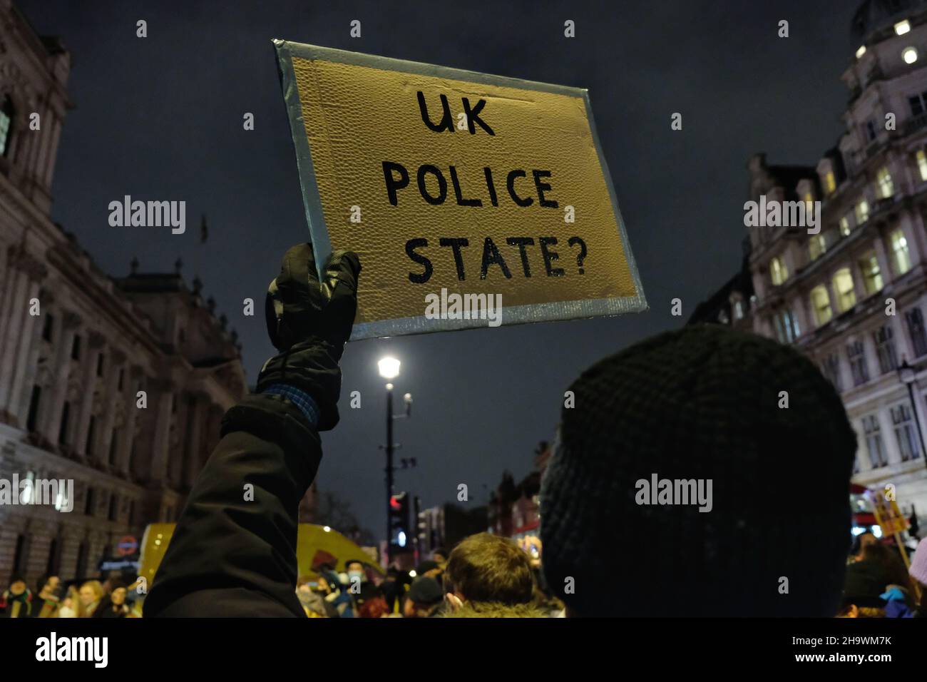 London, UK, 8th Dec, 2021, A person holds up a placard  at the 'Kill the Bill' protest in Westminster as the third reading of the Police, Crime, Sentencing and Courts Bill (PCSC) was underway in the House of Lords. The new legislation, if passed, will grant police additional powers to crack-down on protest by allowing stop-and-search, data sharing of activists details and the breaking-up of demonstrations deemed as causing 'serious annoyance'. Credit: Eleventh Hour Photography/Alamy Live News Stock Photo