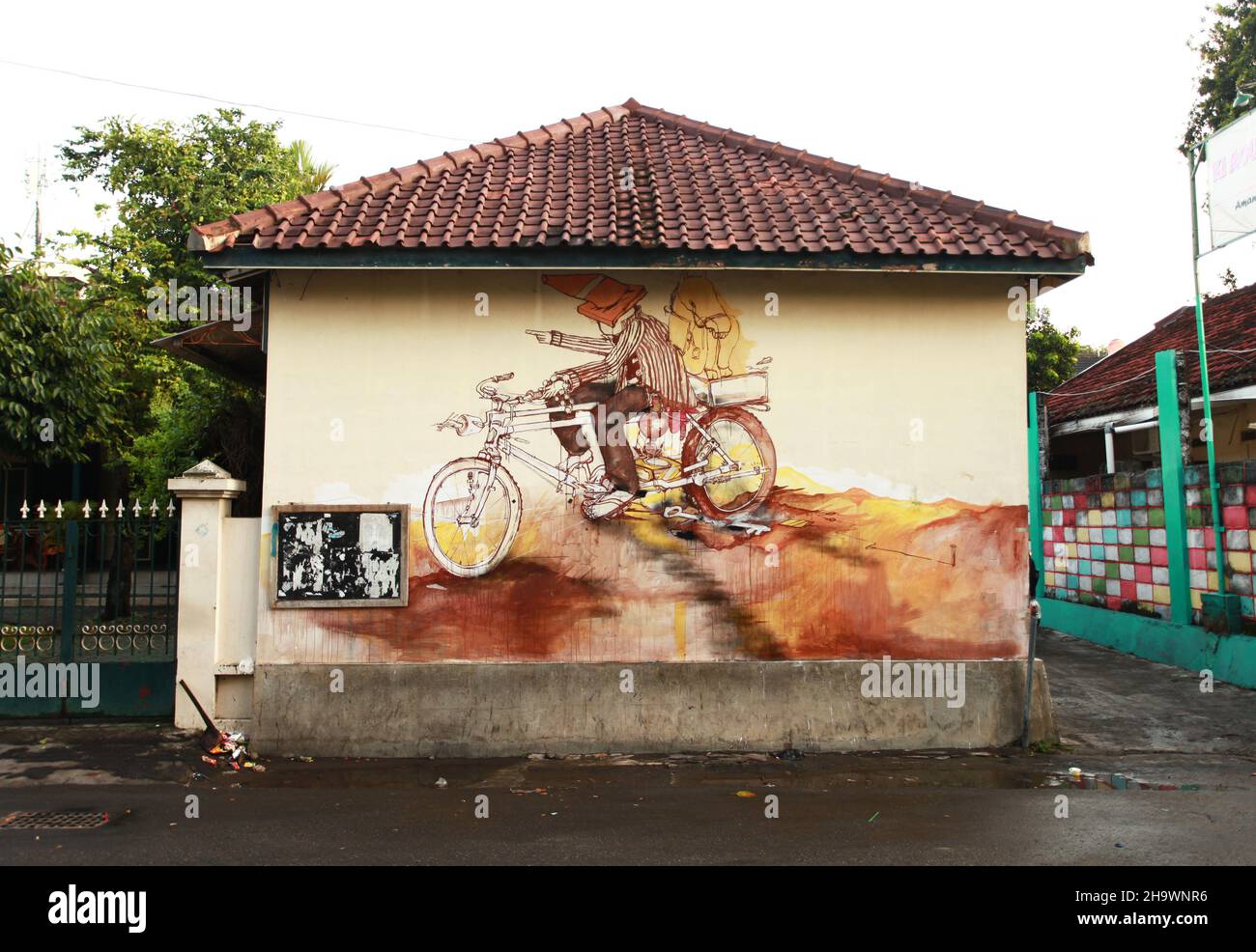 Graffiti artwork on buildings and walls on Prawirotaman street in Yogyakarta, Central Java, Indonesia. Stock Photo