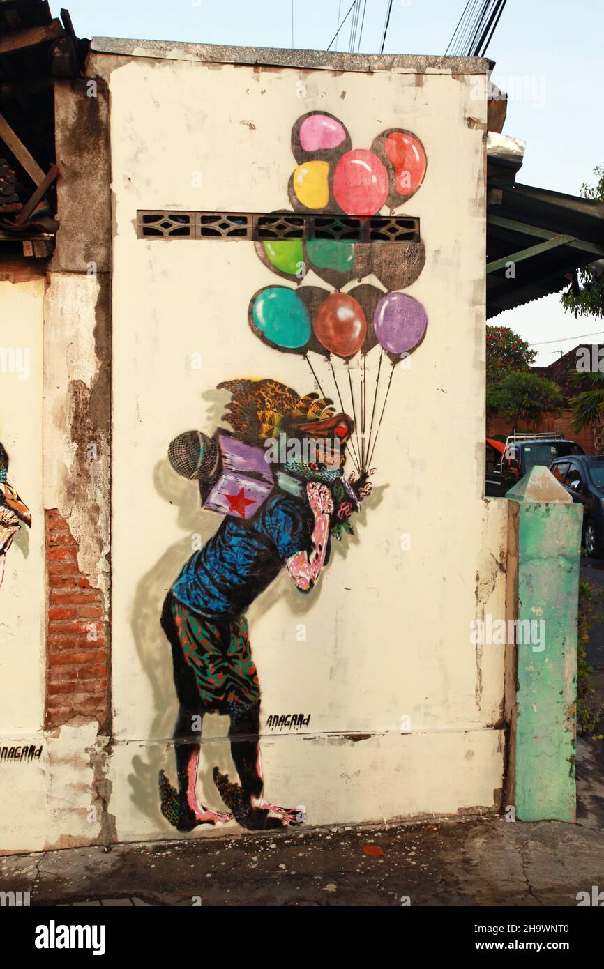 Graffiti artwork on buildings and walls on Prawirotaman street in