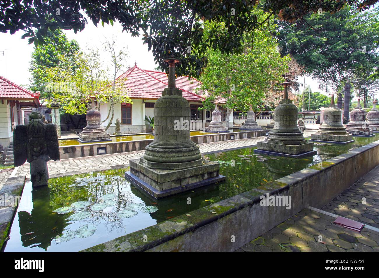 The Mendut Buddhist Monastery located beside the ancient 9th Century AD Mendut Temple in Central Java, Indonesia. Stock Photo