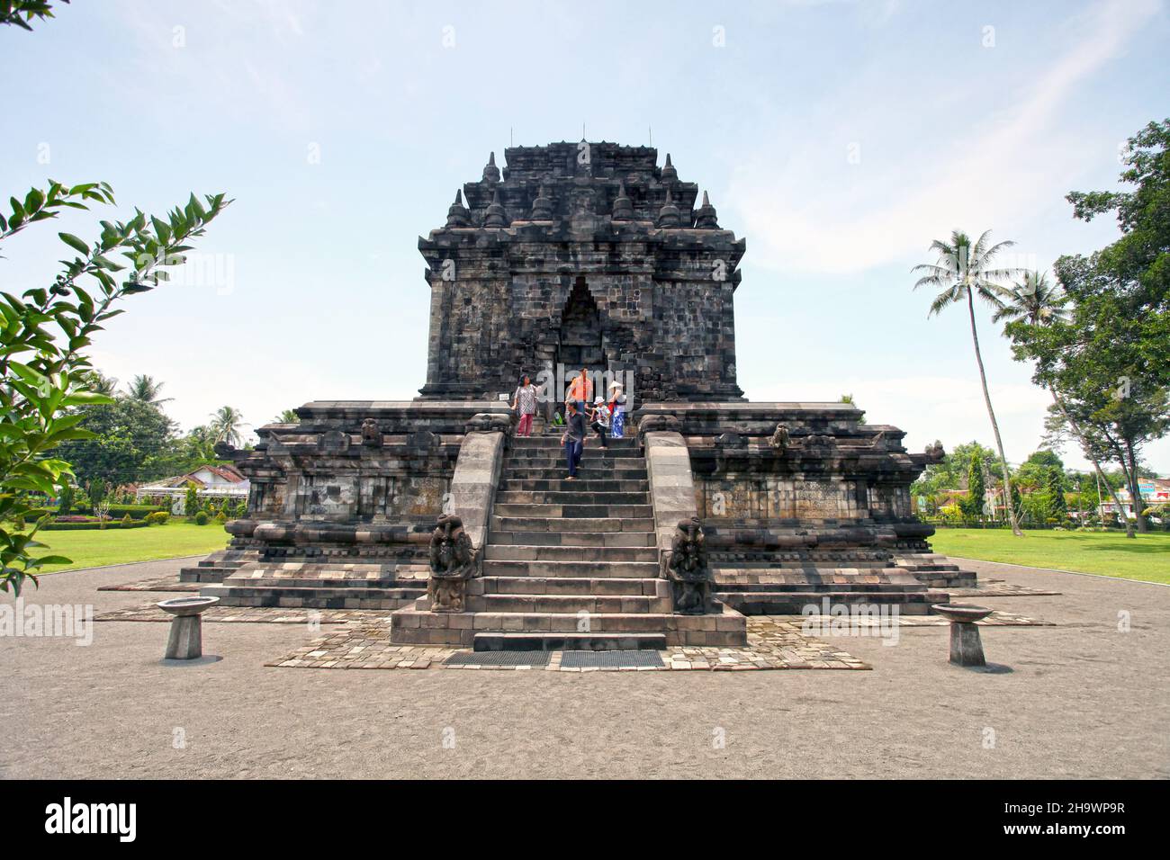 The Mendut Temple in Mendut village in Magelang built in the 9th Century AD in Central Java, Indonesia is just 3 km from Borobudur. Stock Photo