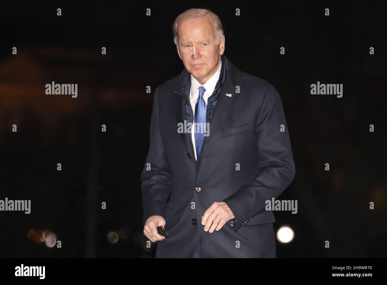 Washington, United States. 08th Dec, 2021. President Joe Biden walks on the South Lawn of the White House on Wednesday, December 8, 2021 in Washington, DC after a trip to Kansas City, Missouri. Photo by Oliver Contreras/UPI Credit: UPI/Alamy Live News Stock Photo