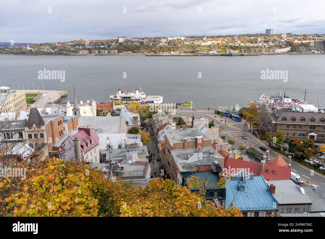 Quebec, Canada - October 19 2021 : Quebec City old town street view and Saint Lawrence River in autumn. Stock Photo