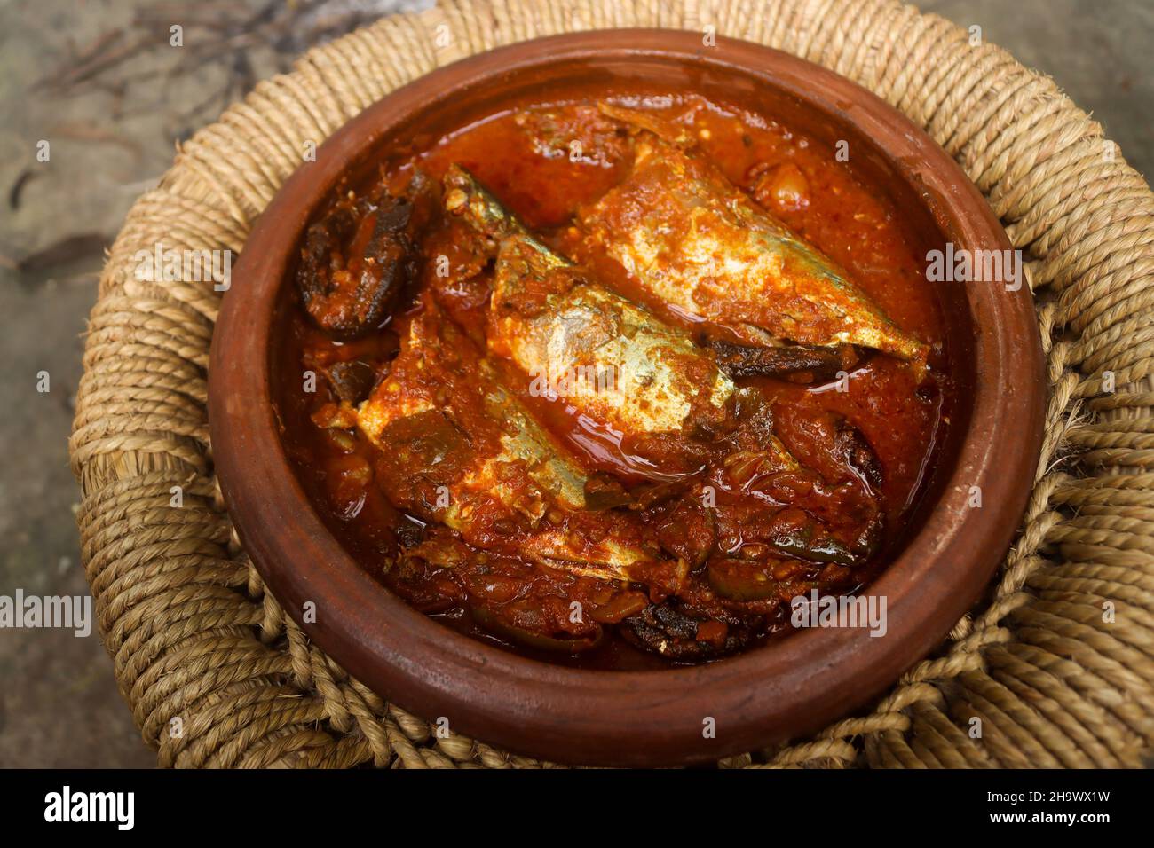 Kerala style fish curry Stock Photo - Alamy