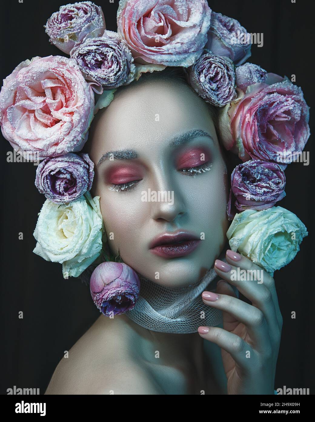 Close-up portrait of a woman with roses Stock Photo - Alamy