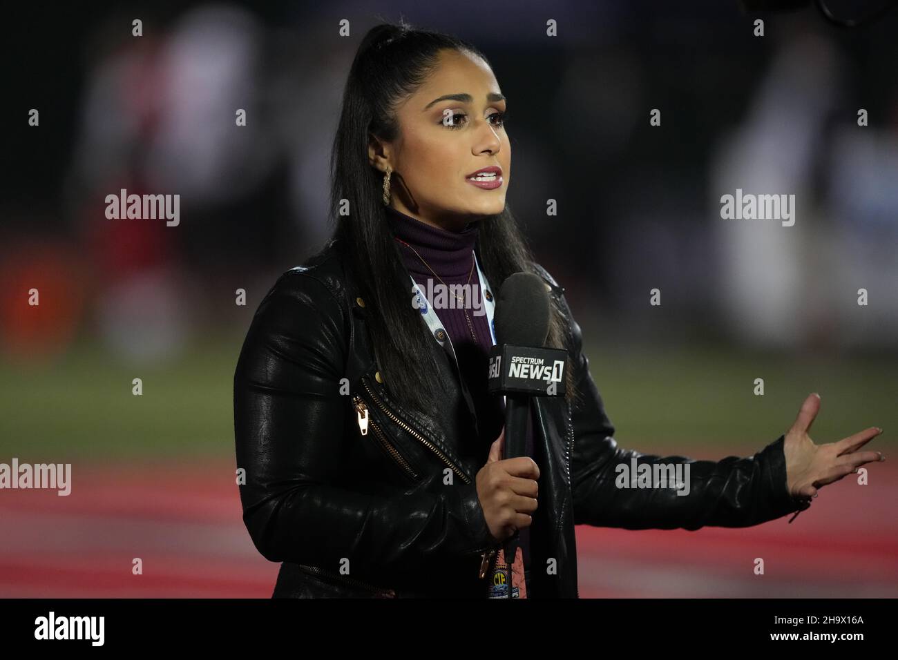 Specrtum 1 News reporter Kristen Lago at the CIF Southern Section Division I football championship between the Servite Friars and the Mater Dei Monarc Stock Photo