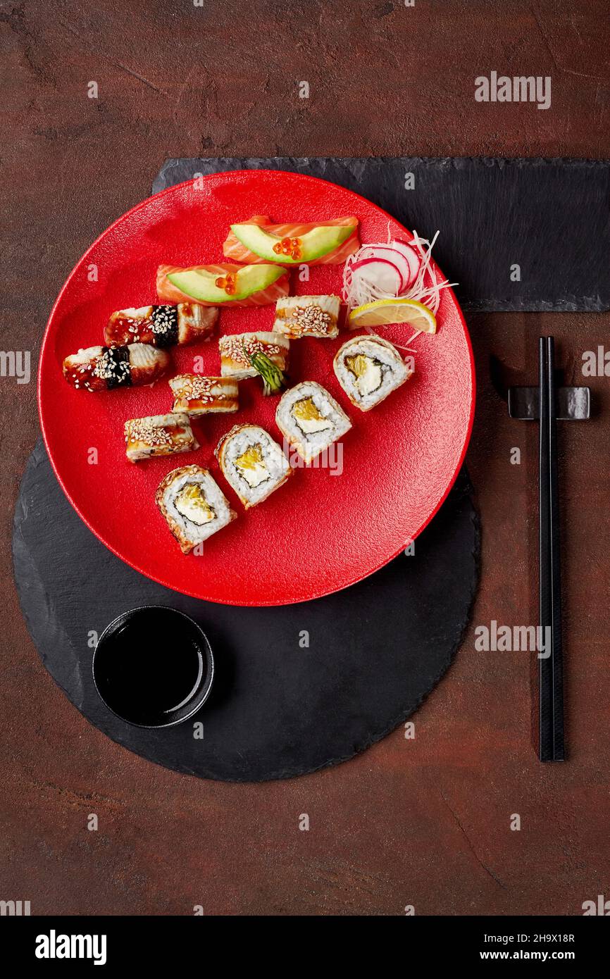 Premium Photo  Japanese food sushi rolls with eel and cream cheese topped  with unagi sauce