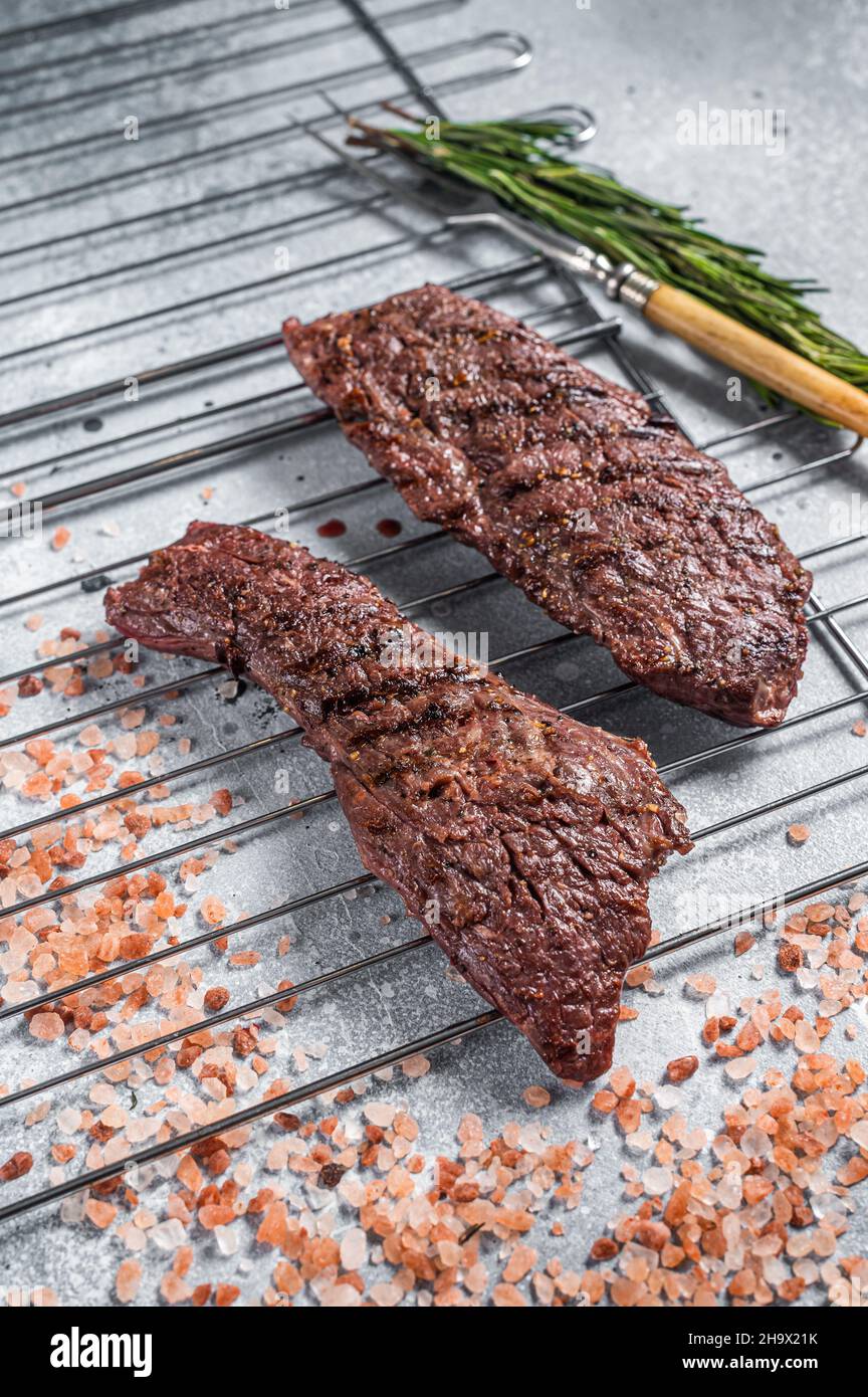 Grilled Flap steak flank cut and Machete skirt steak on grill with