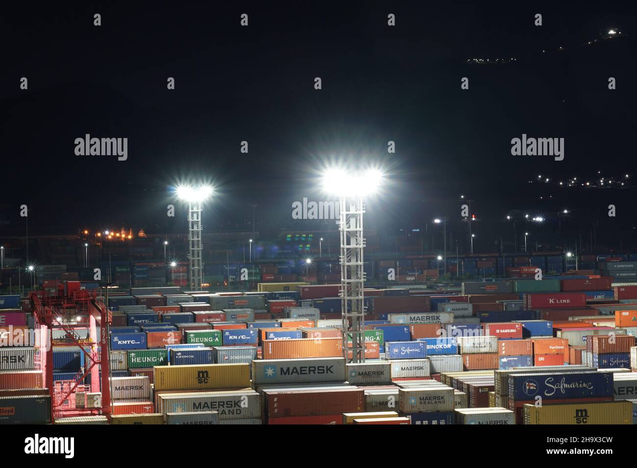 Plenty stowed containers from different shippers observed  during the night. Stock Photo