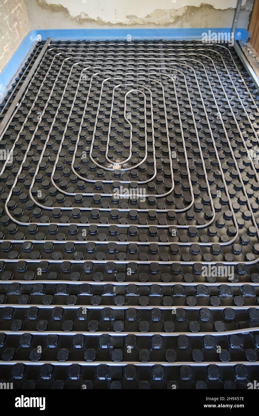 Radiant floor heating and cooling installation. Stock Photo
