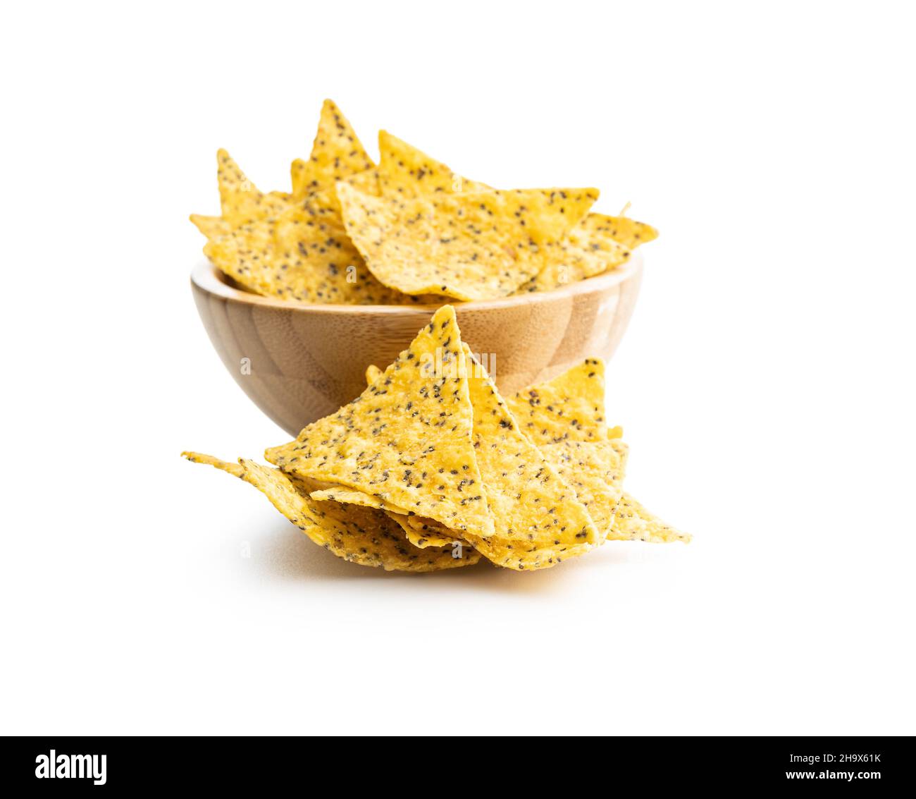 Salted tortilla chips triangle with chia seeds isolated on white background. Stock Photo