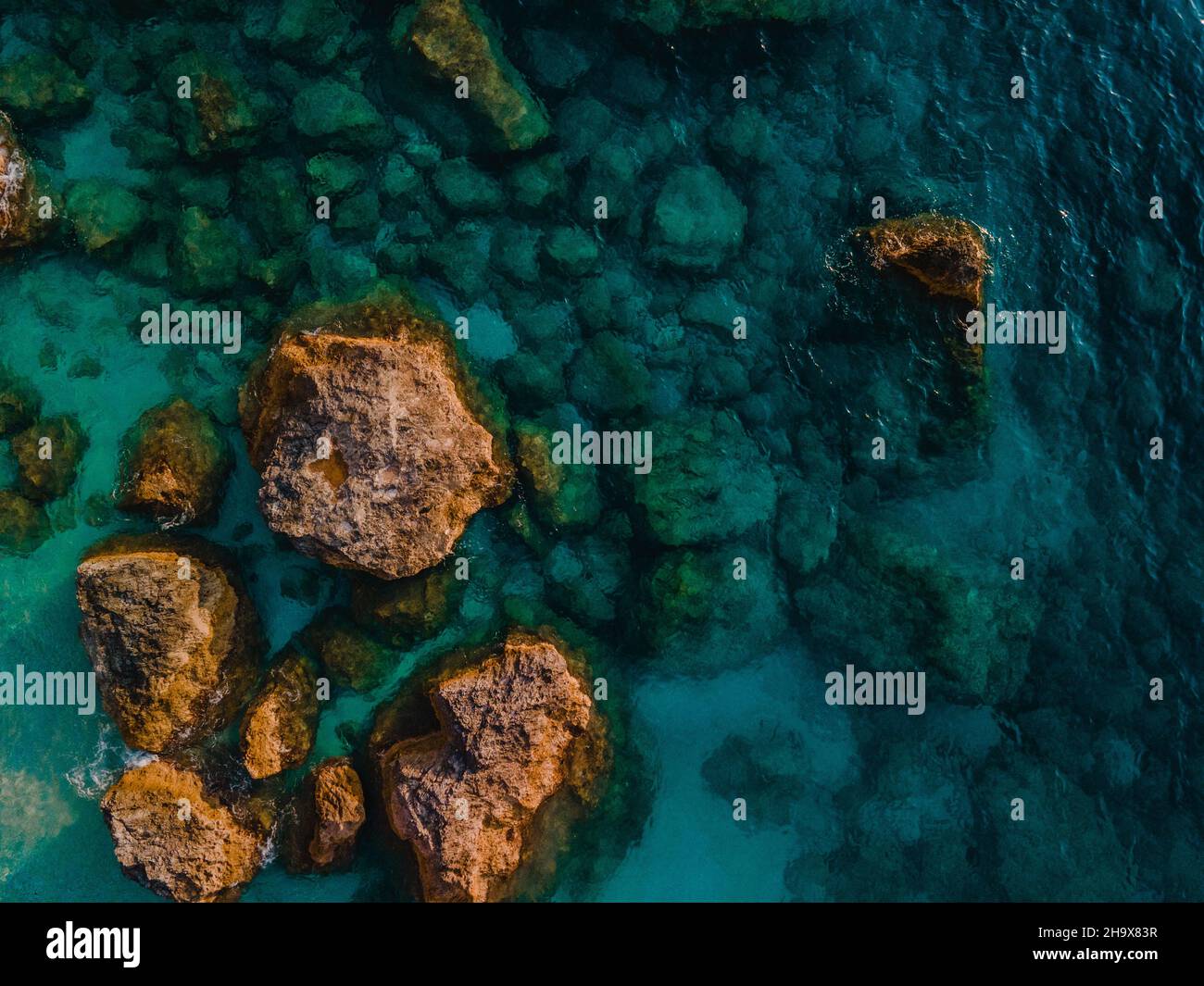 aerial view of sea rocky beach clear azure water Stock Photo - Alamy
