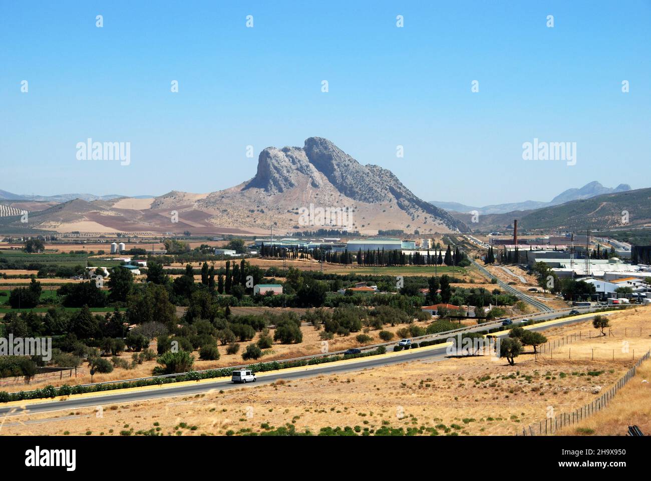 View of the Lovers Rock (La Peña de los Enamoradas) and surrounding countryside, Antequera, Spain. Stock Photo